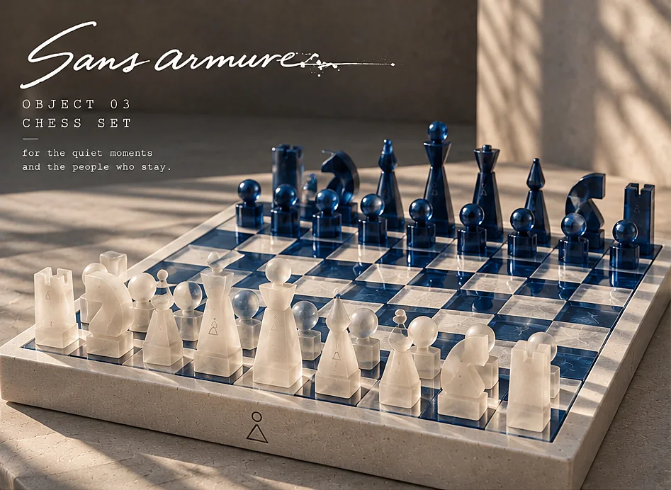 Chess set with blue and white resin pieces on a stone and resin board