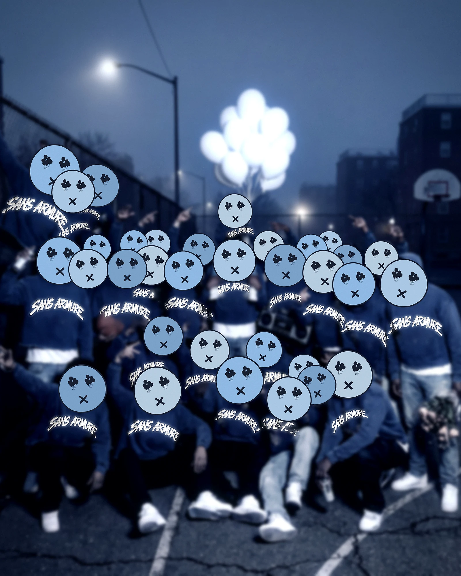 A crowd in blue Sans Armure hoodies on a night basketball court under white balloons